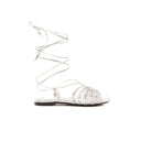 Silver strappy sandal on a white background