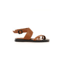 Brown sandal with a black sole on a white background